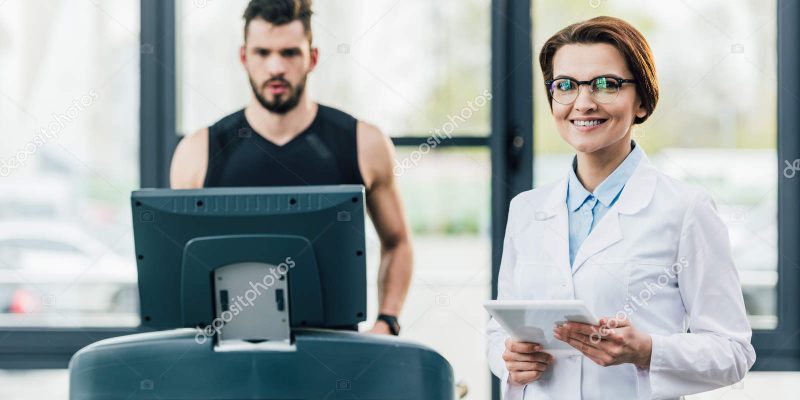 depositphotos_273810966-stock-photo-sportsman-running-treadmill-smiling-doctor depositphotos_273810966-stock-photo-sportsman-running-treadmill-smiling-doctor